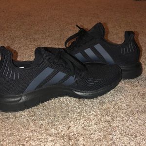 All black kids size 7 adidas. Fits women’s 8.5!